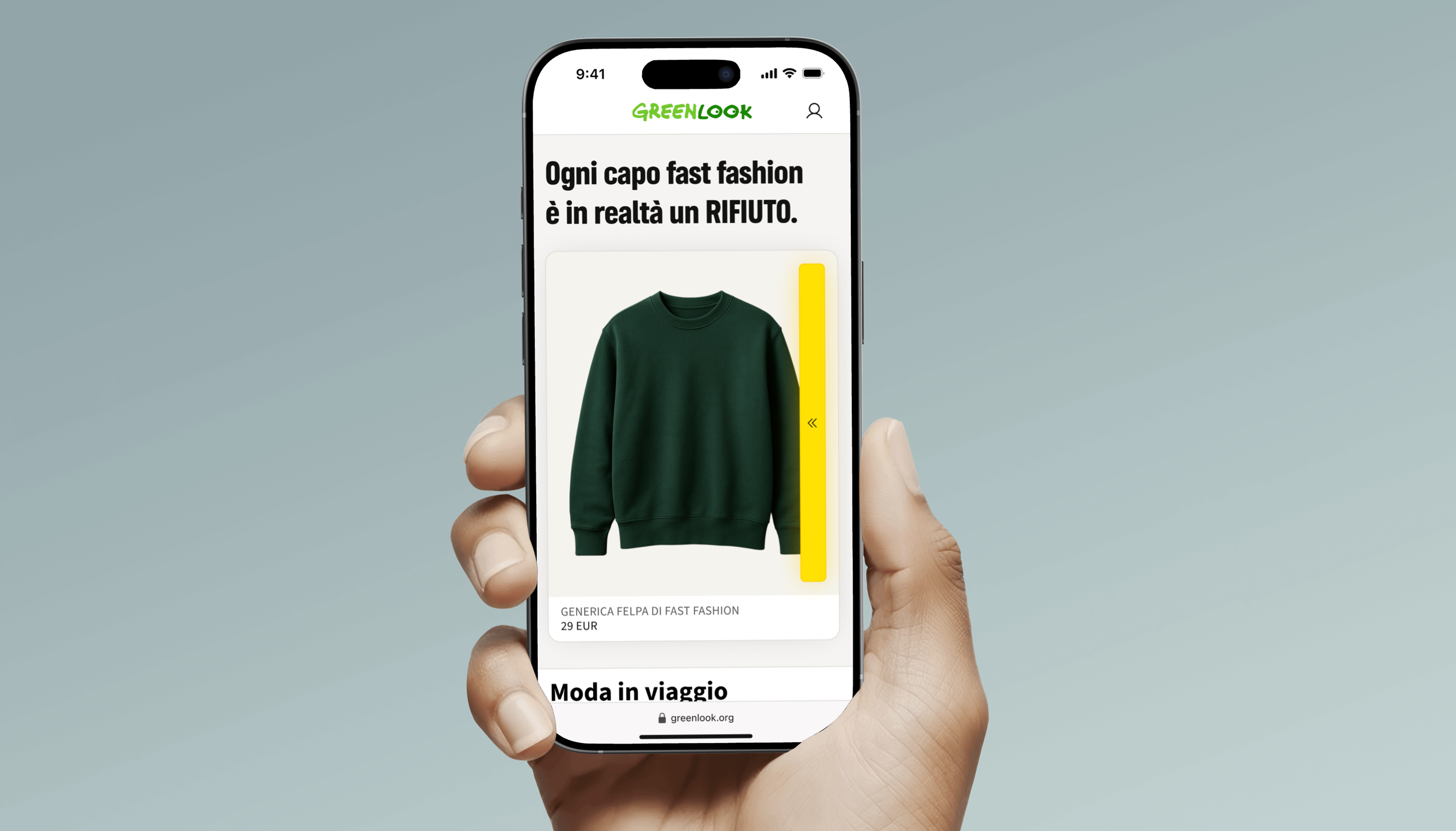 A hand holding a smartphone. On the screen, there is a landing page displaying a phrase against fast fashion and an image of a sweater.